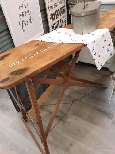 Ironing board with spiritual phrase