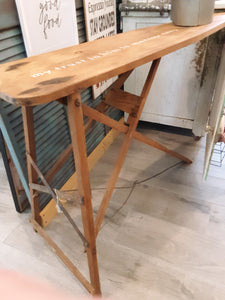 Ironing board with spiritual phrase