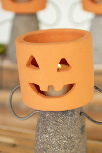 clay jack-o-lantern shelf sitter