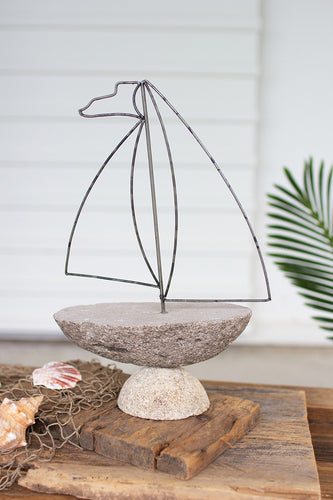river rock and wire sailboat