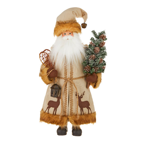 SANTA HOLDING SNOW SHOES AND TREE